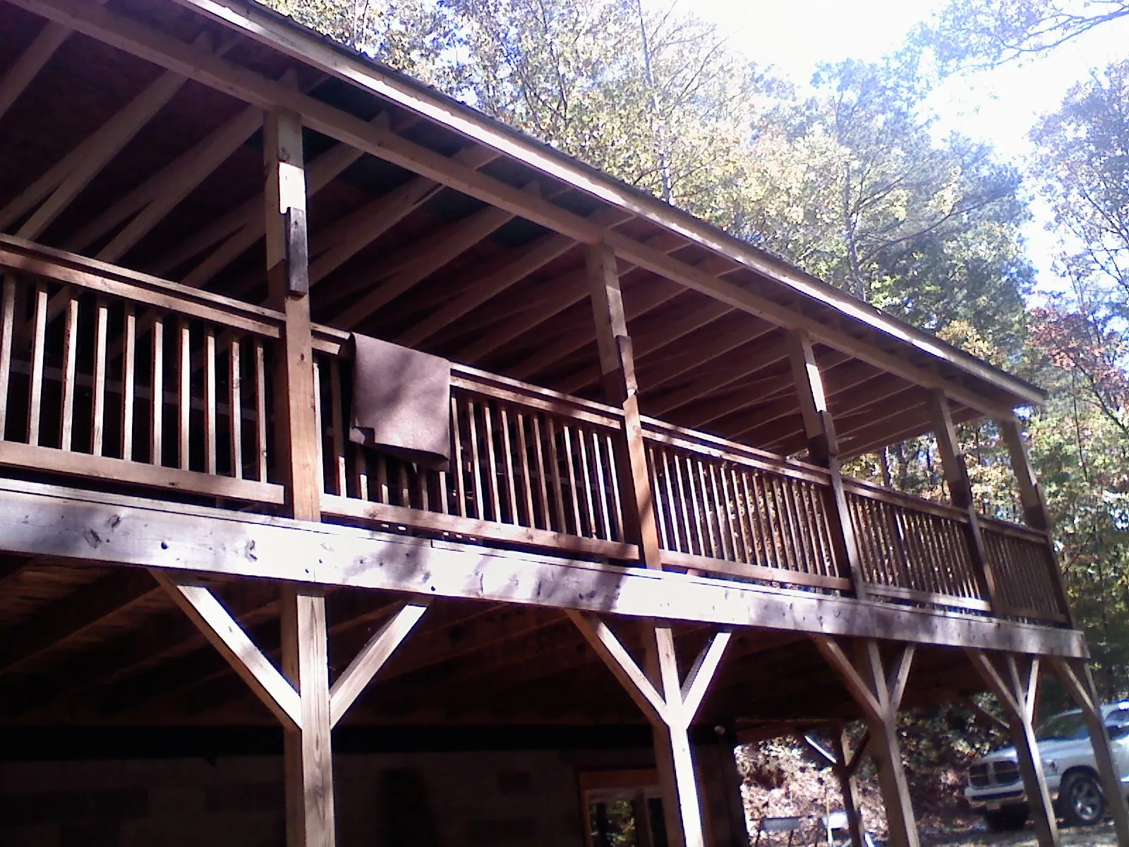 Timber framing under a new elevated porch and deck — Roof Leak Repair in Remington by Roofing Brothers